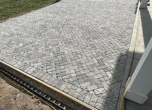 Natural bluestone patio with retaining walls