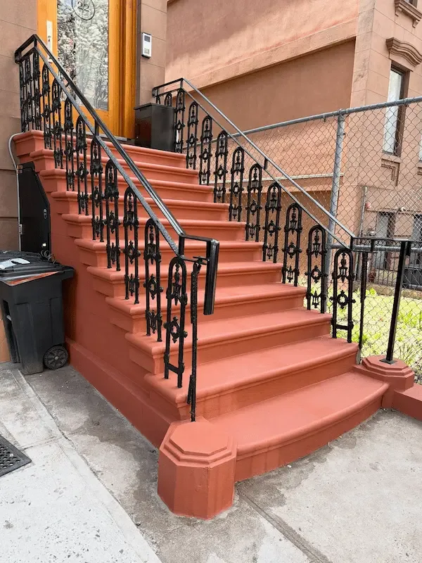 Custom curved staircase in grand entry hall
